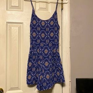 Blue tank romper with open back